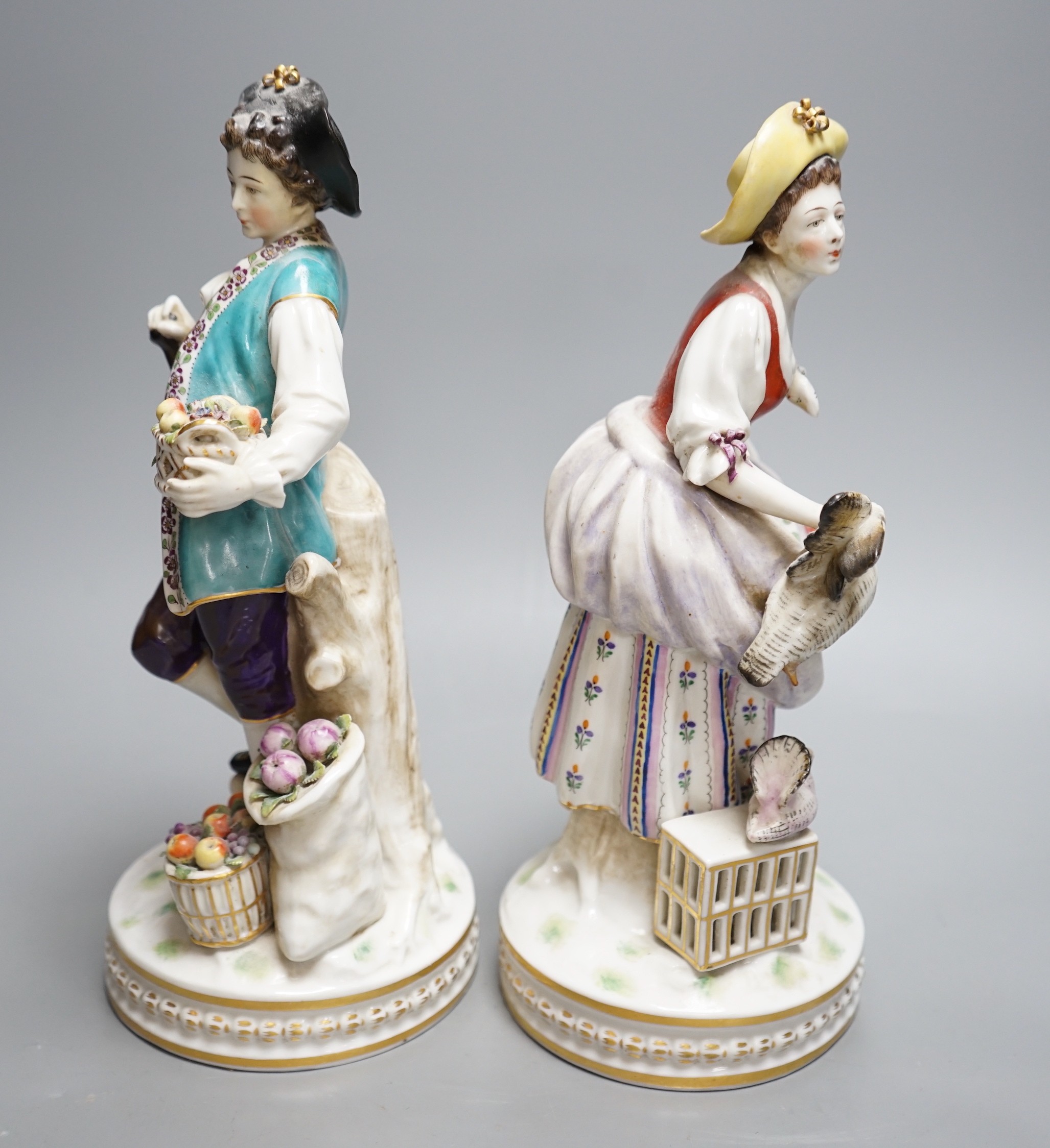 A pair of early 20th century Italian porcelain figures, 29.5cm